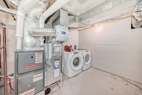 401-250 Fireside View, Cochrane, AB - Indoor Photo Showing Laundry Room
