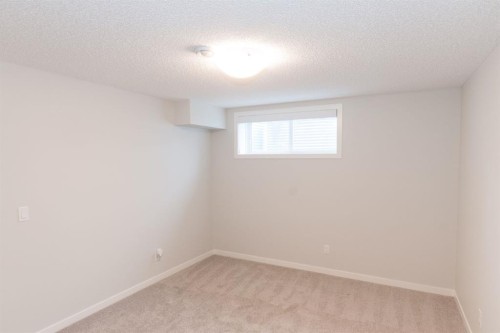 401-250 Fireside View, Cochrane, AB - Indoor Photo Showing Other Room
