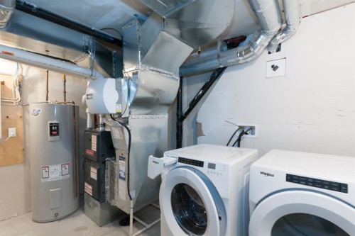 401-250 Fireside View, Cochrane, AB - Indoor Photo Showing Laundry Room