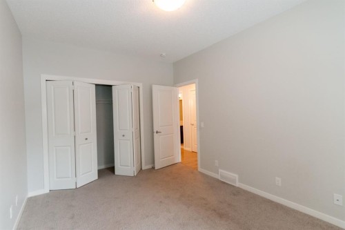 401-250 Fireside View, Cochrane, AB - Indoor Photo Showing Other Room