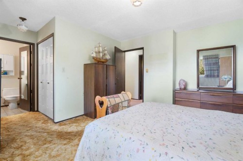 4214 50 Avenue, Olds, AB - Indoor Photo Showing Bedroom