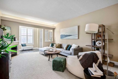 15-27 Springborough Boulevard Sw, Calgary, AB - Indoor Photo Showing Living Room