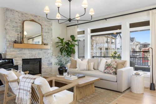 44 Alpine Common Sw, Calgary, AB - Indoor Photo Showing Living Room With Fireplace