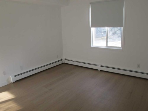 1117-12 Cimarron Common, Okotoks, AB - Indoor Photo Showing Other Room