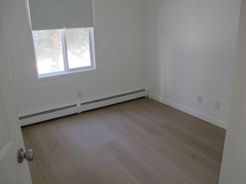 1117-12 Cimarron Common, Okotoks, AB - Indoor Photo Showing Other Room