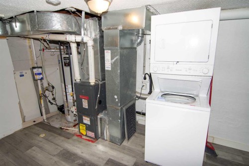 129 30 Avenue Nw, Calgary, AB - Indoor Photo Showing Laundry Room