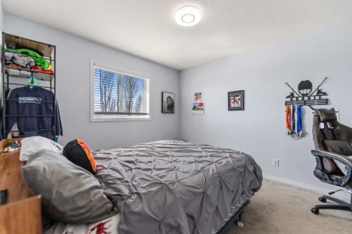 328 Rainbow  Falls Way, Chestermere, AB - Indoor Photo Showing Bedroom