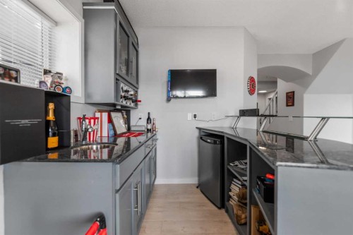 328 Rainbow  Falls Way, Chestermere, AB - Indoor Photo Showing Kitchen