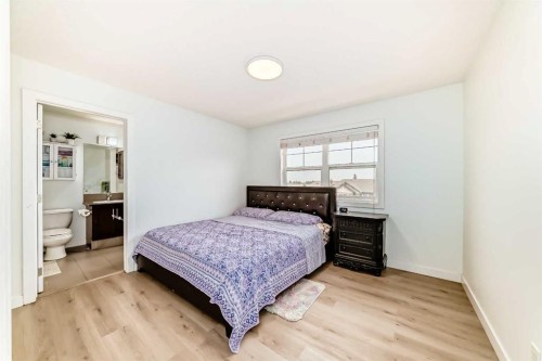 119 Panatella Hill Nw, Calgary, AB - Indoor Photo Showing Bedroom