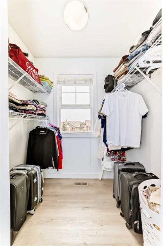 119 Panatella Hill Nw, Calgary, AB - Indoor With Storage