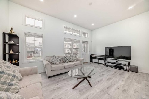119 Panatella Hill Nw, Calgary, AB - Indoor Photo Showing Living Room