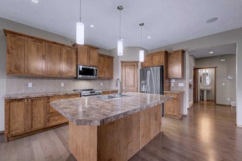 244 Eversyde Mews Sw, Calgary, AB - Indoor Photo Showing Kitchen With Double Sink With Upgraded Kitchen