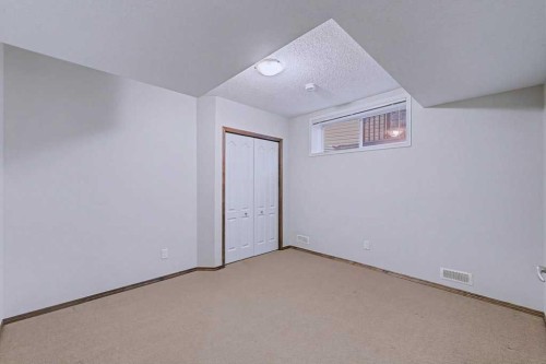 244 Eversyde Mews Sw, Calgary, AB - Indoor Photo Showing Other Room