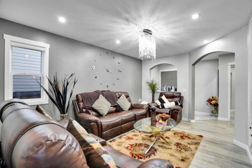 91 Copperstone Gate Se, Calgary, AB - Indoor Photo Showing Living Room