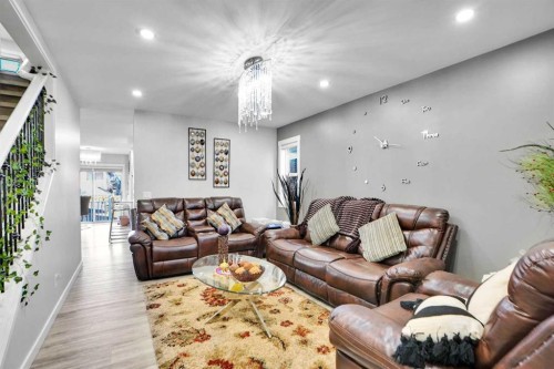 91 Copperstone Gate Se, Calgary, AB - Indoor Photo Showing Living Room
