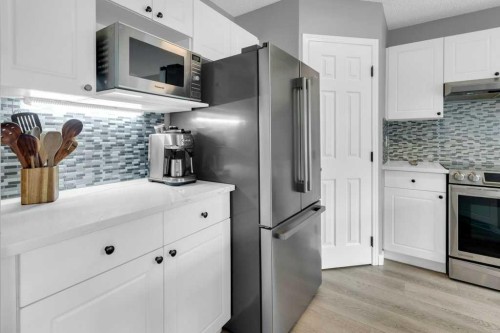 11185 Hidden Valley Drive Nw, Calgary, AB - Indoor Photo Showing Kitchen