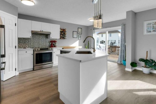 11185 Hidden Valley Drive Nw, Calgary, AB - Indoor Photo Showing Kitchen With Upgraded Kitchen