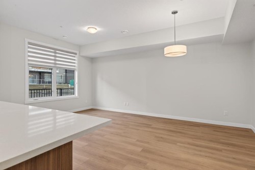203-400 Belmont Street Sw, Calgary, AB - Indoor Photo Showing Other Room
