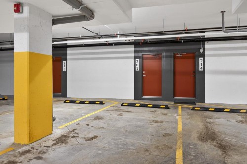 203-400 Belmont Street Sw, Calgary, AB - Indoor Photo Showing Garage