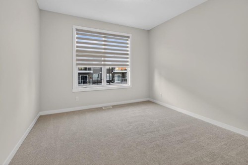 203-400 Belmont Street Sw, Calgary, AB - Indoor Photo Showing Other Room