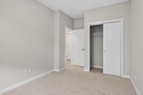 203-400 Belmont Street Sw, Calgary, AB - Indoor Photo Showing Other Room