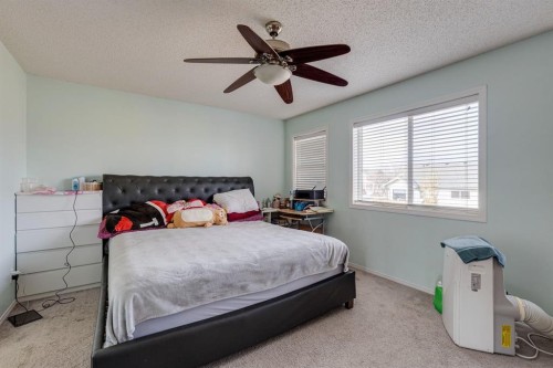 47 Westmount Road, Okotoks, AB - Indoor Photo Showing Bedroom