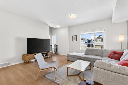 54 Cranbrook Gardens Se, Calgary, AB - Indoor Photo Showing Living Room