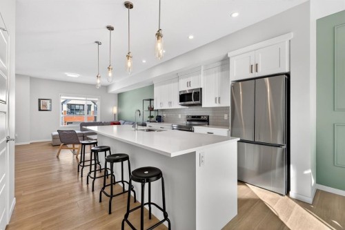 54 Cranbrook Gardens Se, Calgary, AB - Indoor Photo Showing Kitchen With Stainless Steel Kitchen With Upgraded Kitchen