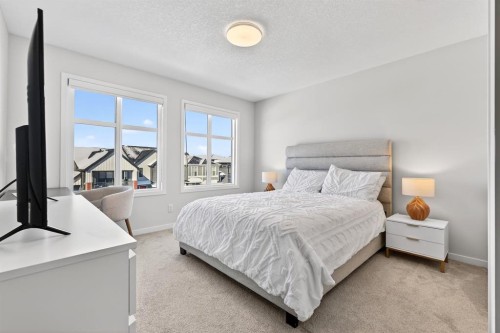 54 Cranbrook Gardens Se, Calgary, AB - Indoor Photo Showing Bedroom