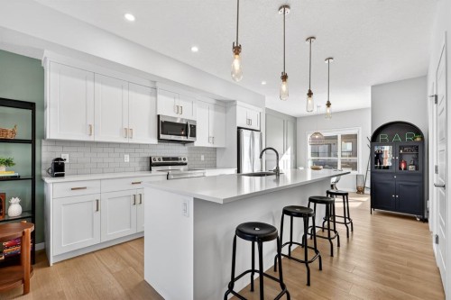 54 Cranbrook Gardens Se, Calgary, AB - Indoor Photo Showing Kitchen With Upgraded Kitchen