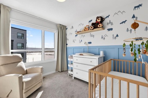 54 Cranbrook Gardens Se, Calgary, AB - Indoor Photo Showing Bedroom