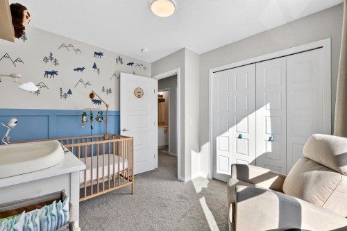 54 Cranbrook Gardens Se, Calgary, AB - Indoor Photo Showing Bedroom