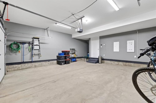 54 Cranbrook Gardens Se, Calgary, AB - Indoor Photo Showing Garage