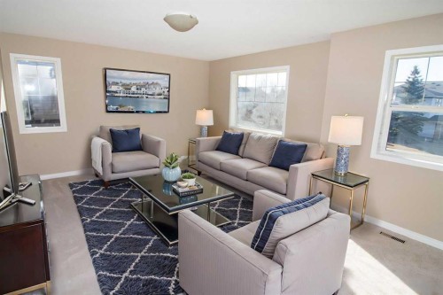 24 Panamount Lane Nw, Calgary, AB - Indoor Photo Showing Living Room