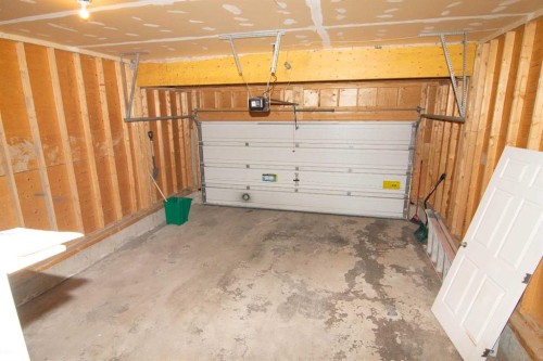24 Panamount Lane Nw, Calgary, AB - Indoor Photo Showing Garage