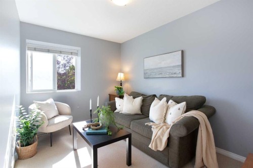 404-703 Luxstone Square Sw, Airdrie, AB - Indoor Photo Showing Living Room