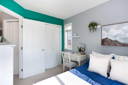 404-703 Luxstone Square Sw, Airdrie, AB - Indoor Photo Showing Bedroom