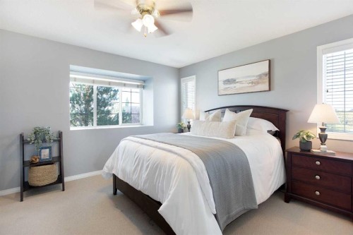404-703 Luxstone Square Sw, Airdrie, AB - Indoor Photo Showing Bedroom