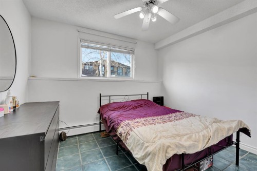 4-104 Sabrina Way Sw, Calgary, AB - Indoor Photo Showing Bedroom