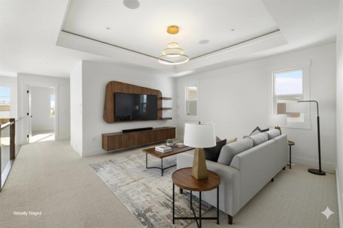 65 Lakes Estates Circle, Strathmore, AB - Indoor Photo Showing Living Room