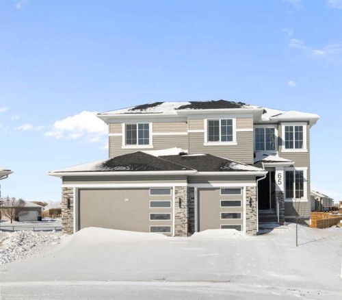 65 Lakes Estates Circle, Strathmore, AB - Outdoor With Facade