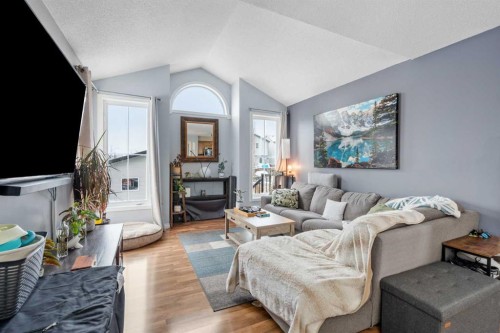 4 Tuscany Ridge Way Nw, Calgary, AB - Indoor Photo Showing Living Room With Fireplace