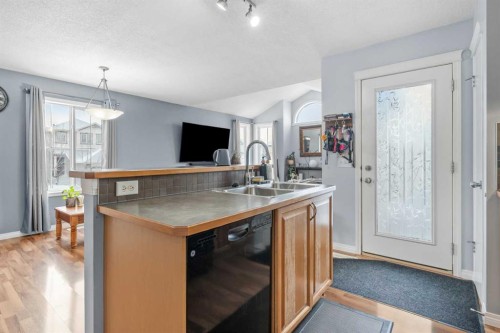 4 Tuscany Ridge Way Nw, Calgary, AB - Indoor Photo Showing Kitchen With Double Sink