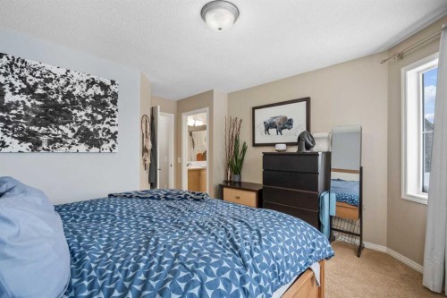 4 Tuscany Ridge Way Nw, Calgary, AB - Indoor Photo Showing Bedroom