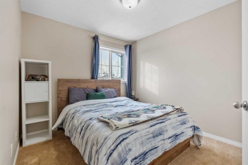 4 Tuscany Ridge Way Nw, Calgary, AB - Indoor Photo Showing Bedroom