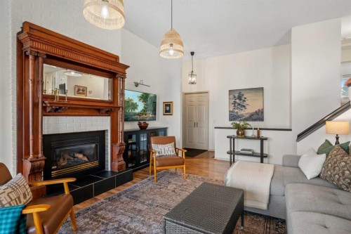 51 Berwick Hill Nw, Calgary, AB - Indoor Photo Showing Living Room With Fireplace
