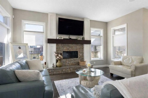 800 E Lakeview Road, Chestermere, AB - Indoor Photo Showing Living Room With Fireplace