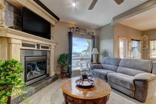 533 Highwood Drive, Longview, AB - Indoor Photo Showing Living Room With Fireplace