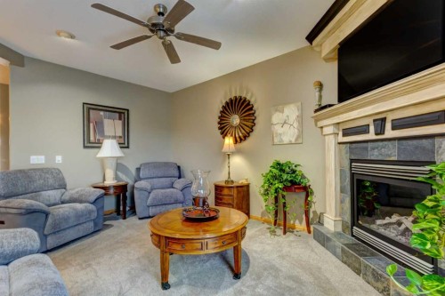 533 Highwood Drive, Longview, AB - Indoor Photo Showing Living Room With Fireplace