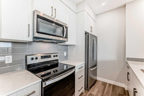 112 Evanscrest Square Nw, Calgary, AB - Indoor Photo Showing Kitchen With Upgraded Kitchen